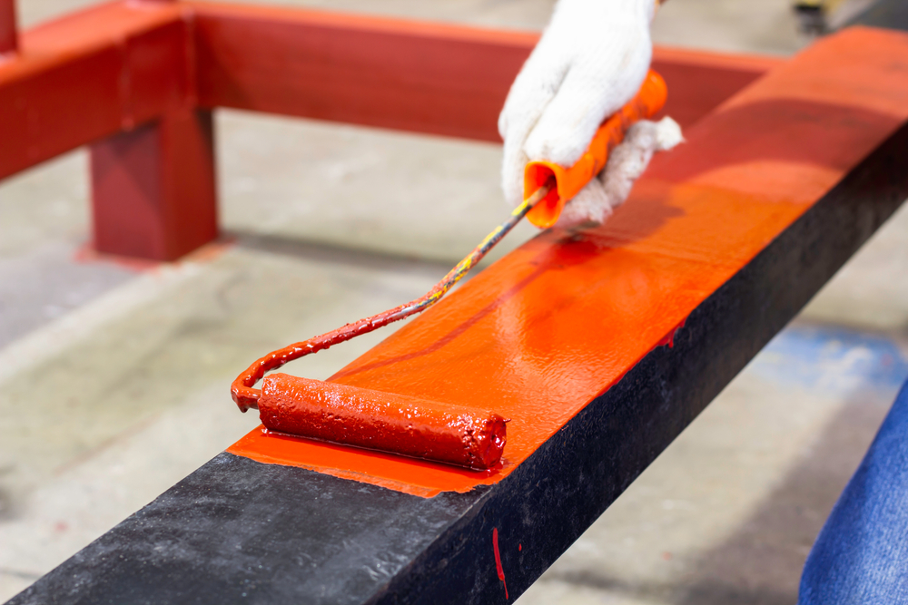 Rust-proof,Painted,Steel,Pipes,In,The,Factory.,Red,Iron,Pipe.
